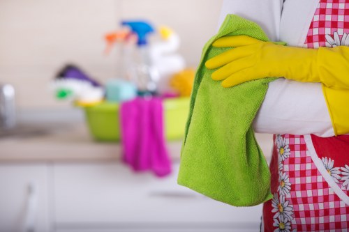 Professional cleaner working in a Richmond TW9 property