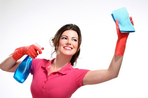 Local cleaners preparing an empty flat for handover in TW9