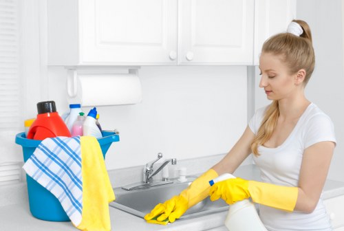 Local carpet cleaning technician treating high-traffic business flooring in TW9